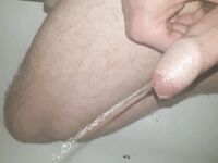Naked cock with my pee slit on show letting out a jet of pee: 10 Nude Pics
