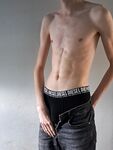 Young smooth twink showing his cock: 14 Nude Pics