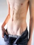 Young smooth twink showing his cock: 14 Nude Pics